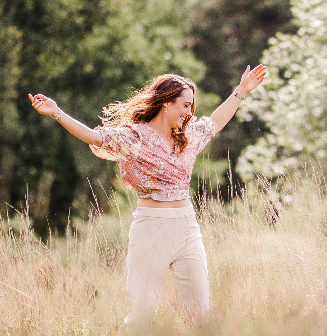 A joyful photo of Nadiya, representing freedom from recurring headaches. This image accompanies the Free Headache Guide opt-in page, where visitors can discover the hidden causes of headaches, the connection between jaw tension and pain.