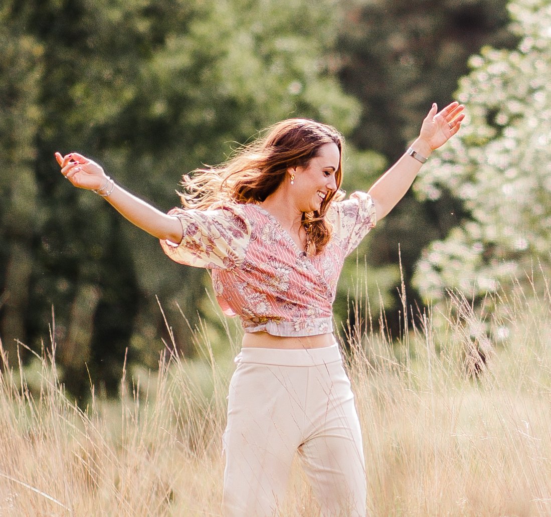 A joyful photo of Nadiya, representing freedom from recurring headaches. This image accompanies the Free Headache Guide opt-in page, where visitors can discover the hidden causes of headaches, the connection between jaw tension and pain.