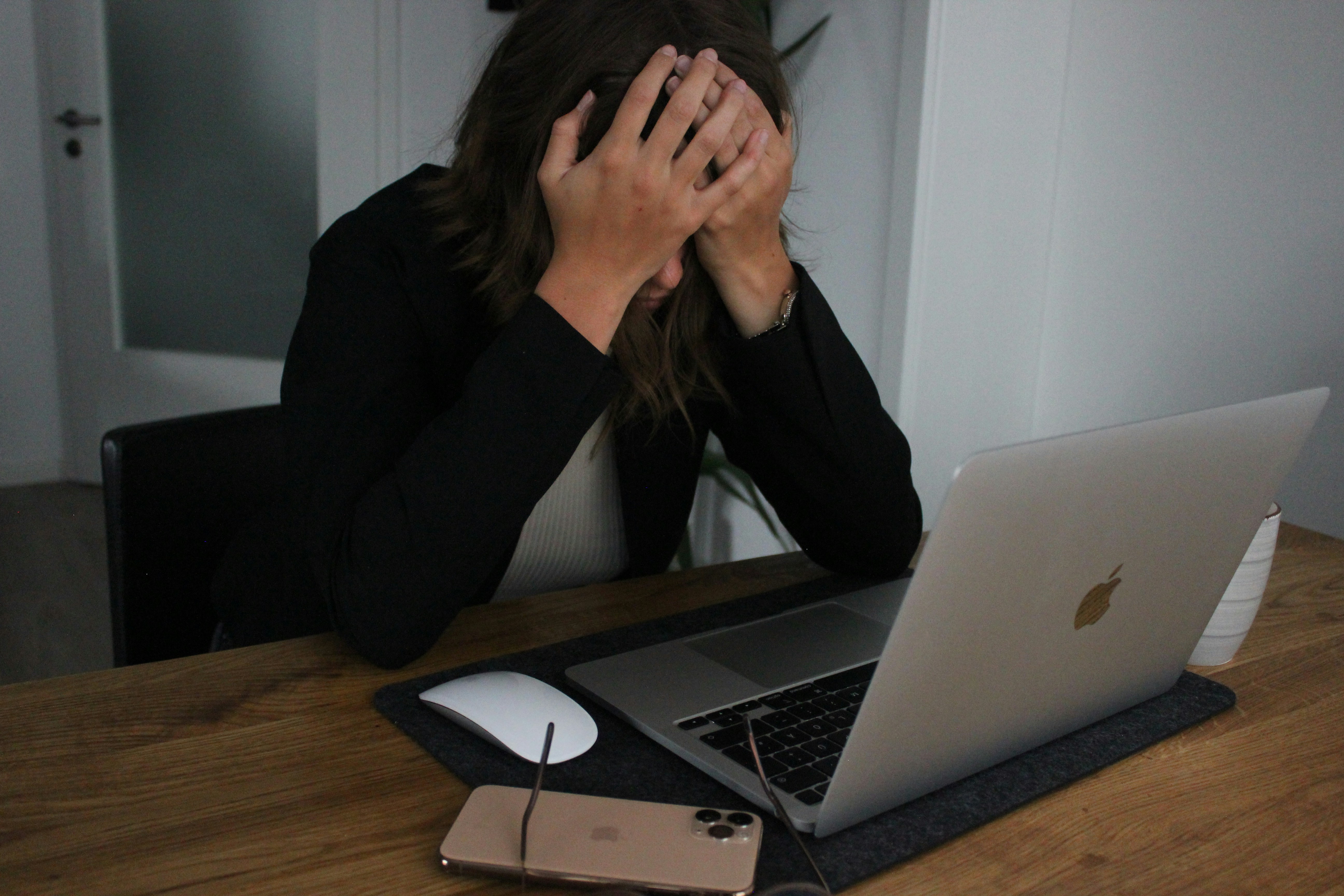 a business woman who is stressed and frustrated