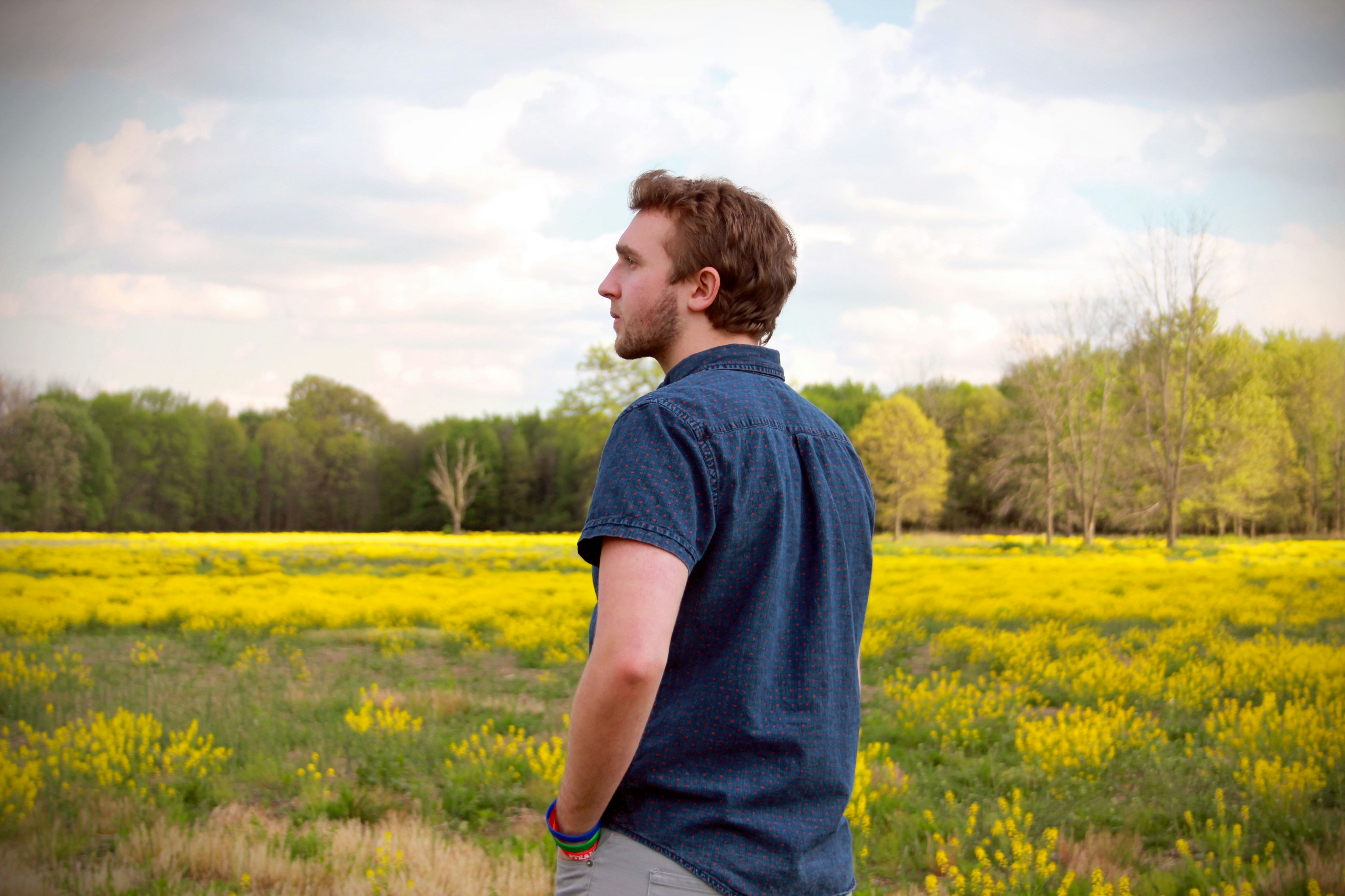 Portraiture in field of yellow flowers. Ohio