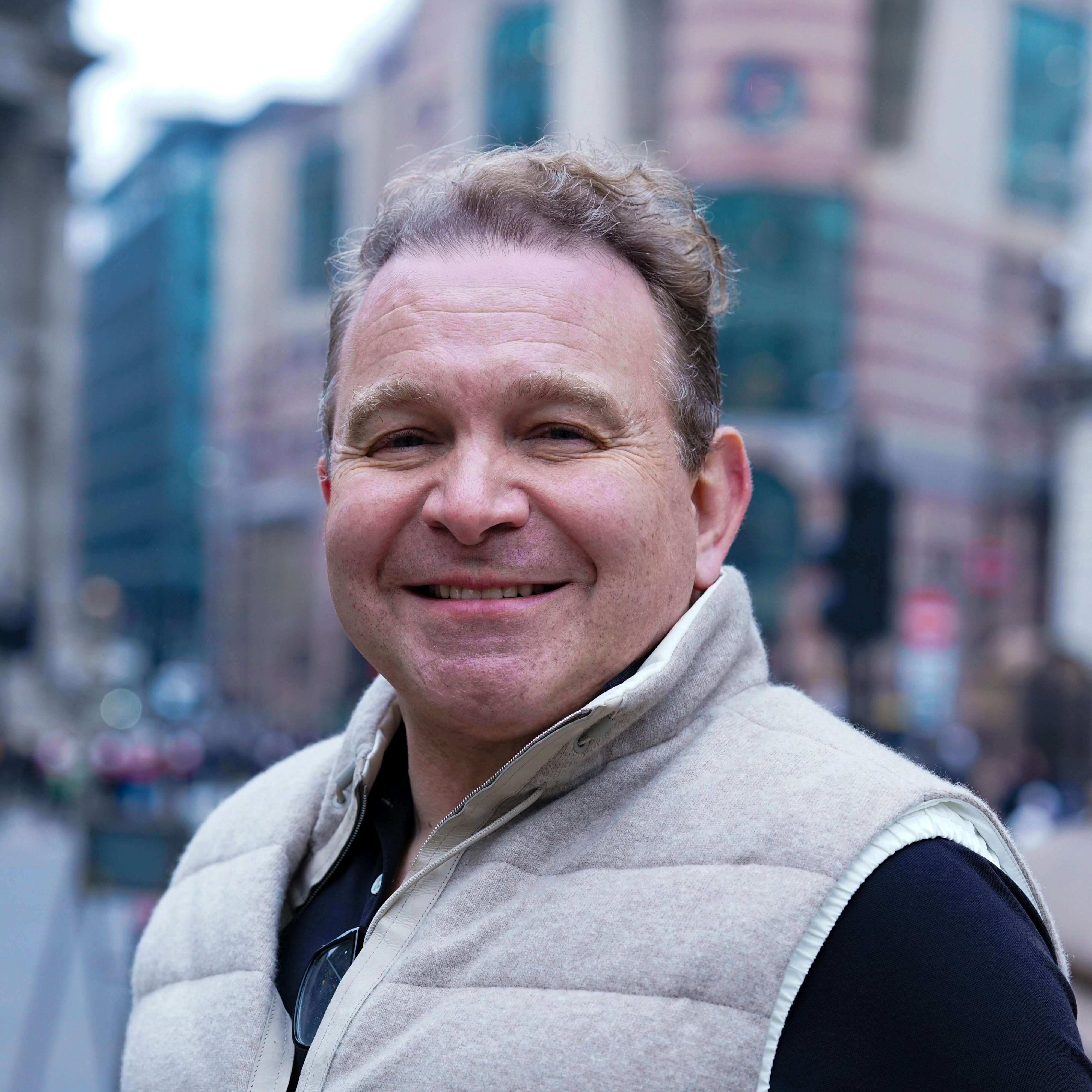 Oliver Larholt strolls through City of London in 2024.