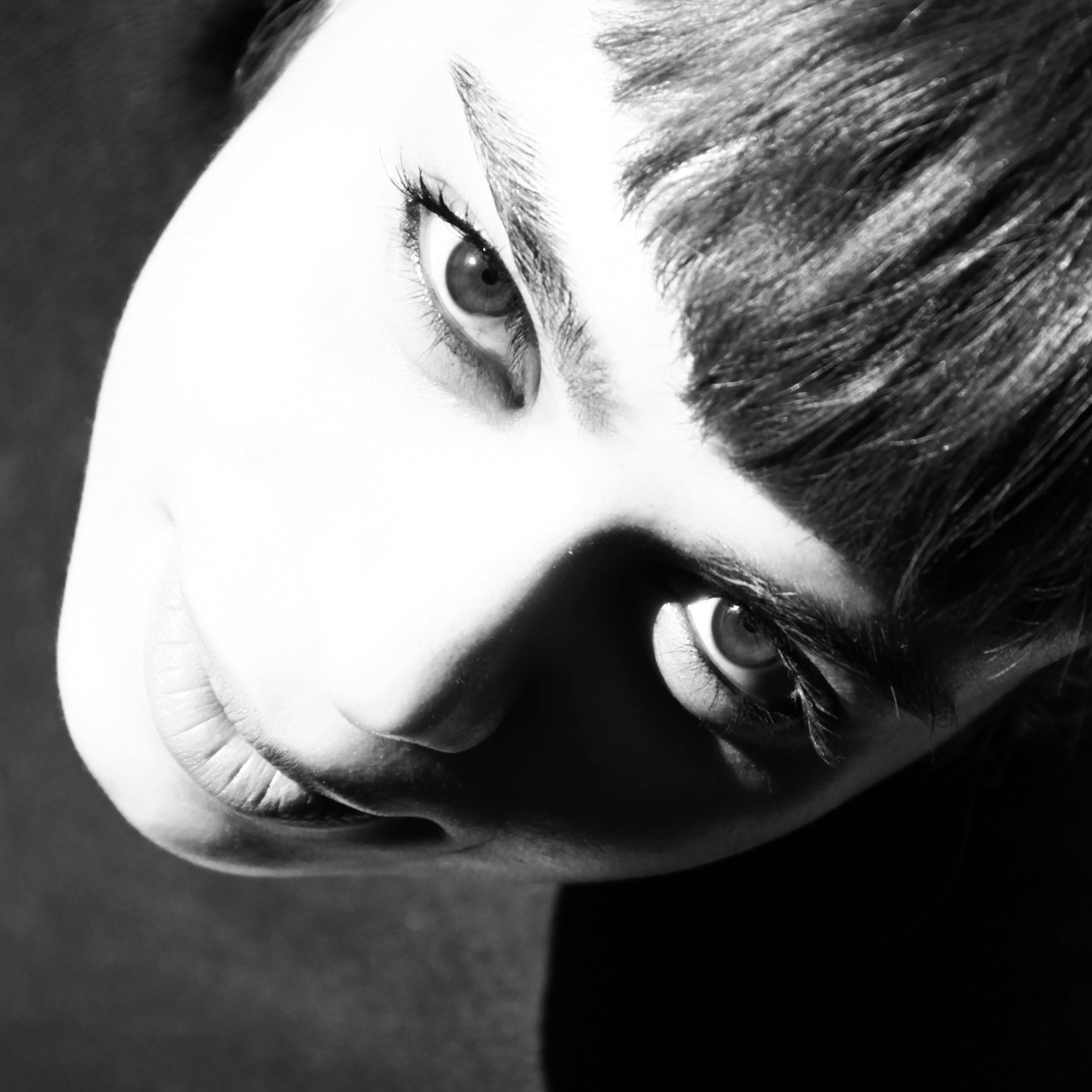 black and white portrait of a beautiful girl with big eyes