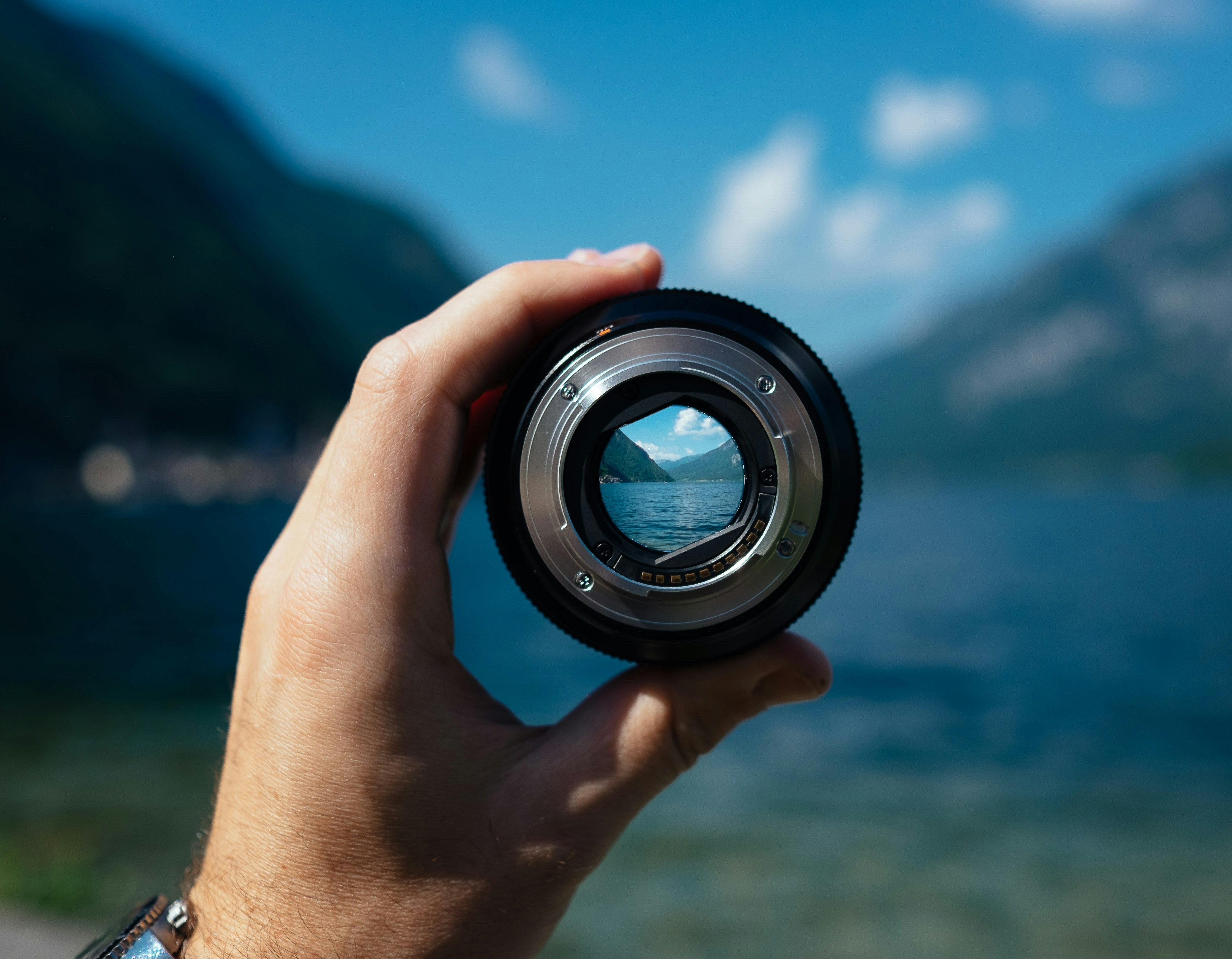 Mountain lake in camera lens