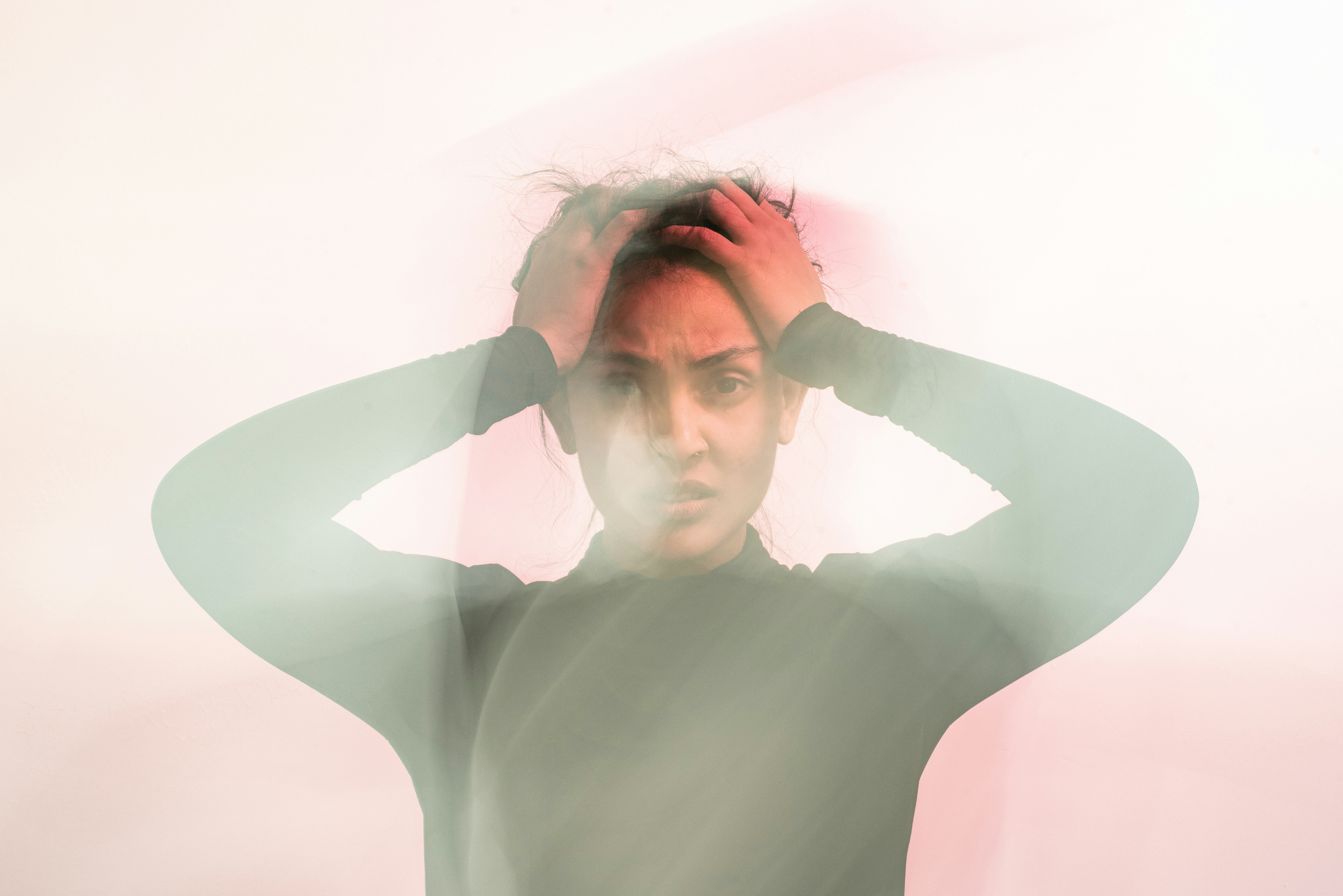 Holding head in confusion and frustration