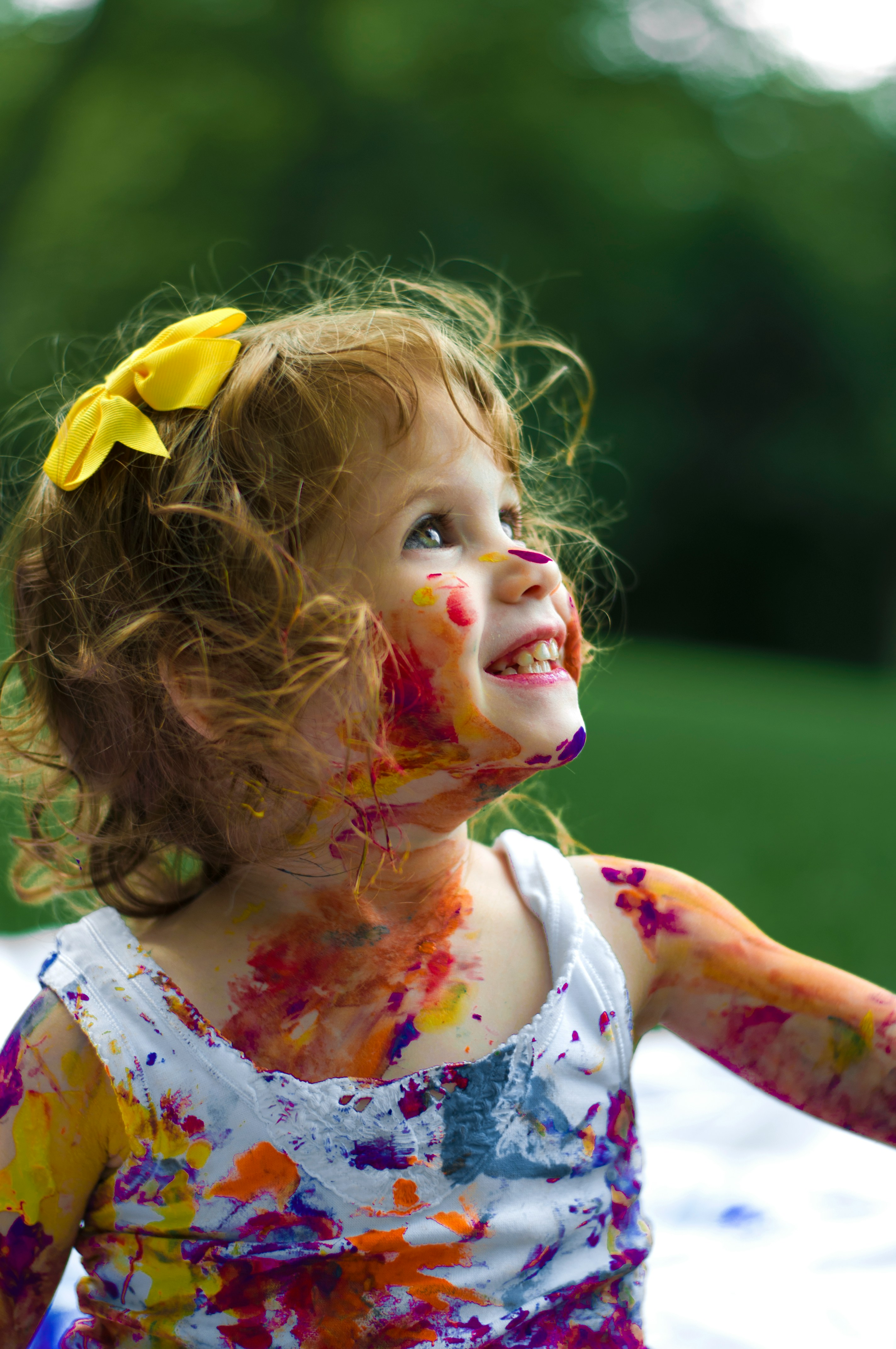 This is two-year-old Malki, her name means Queen in Yiddish. We were at the park playing with paint and bubbles and this shot was a remarkably lucky one since toddlers move so fast. This photo is important to me because it captures her innocence and remin