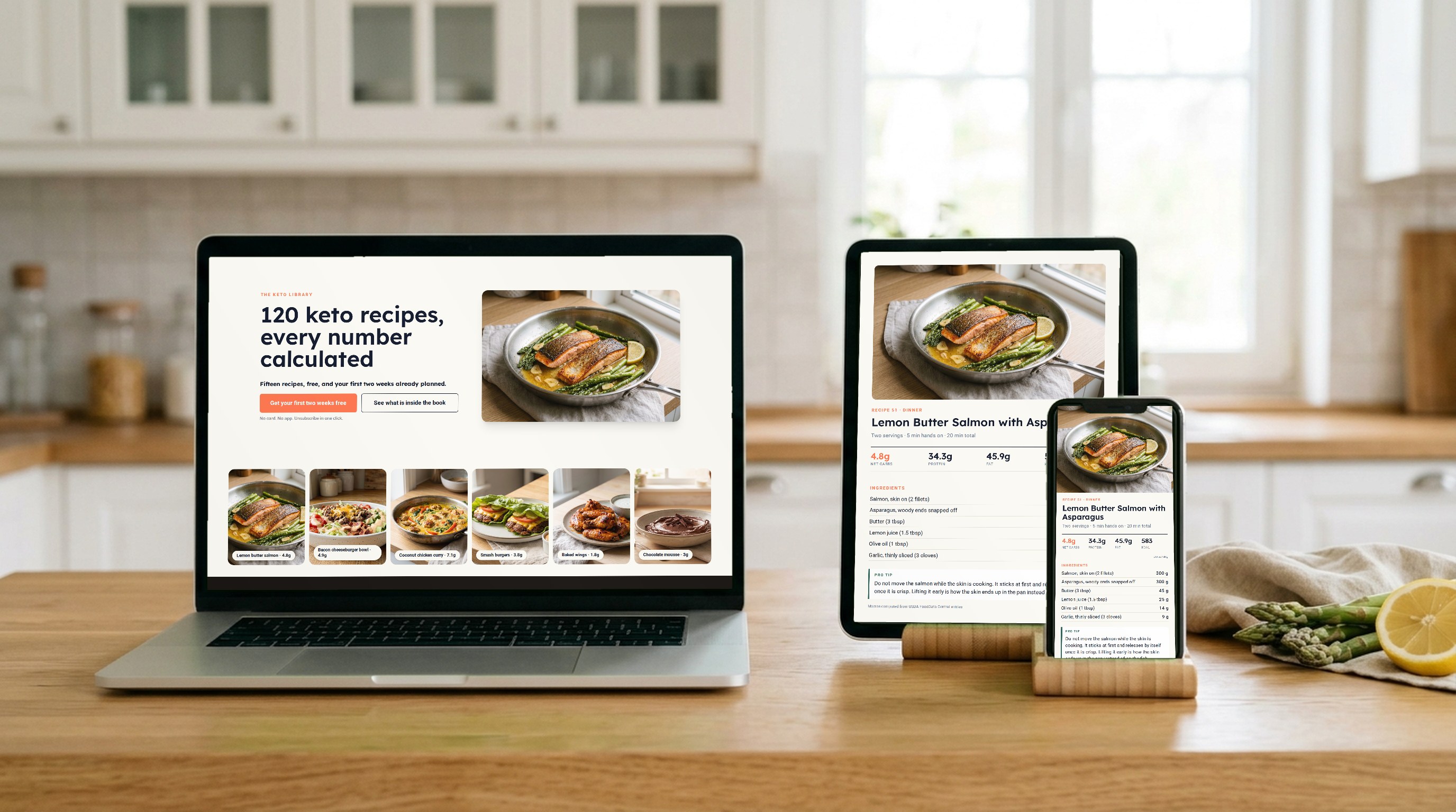 The Keto Library shown on a laptop, tablet and phone in a kitchen