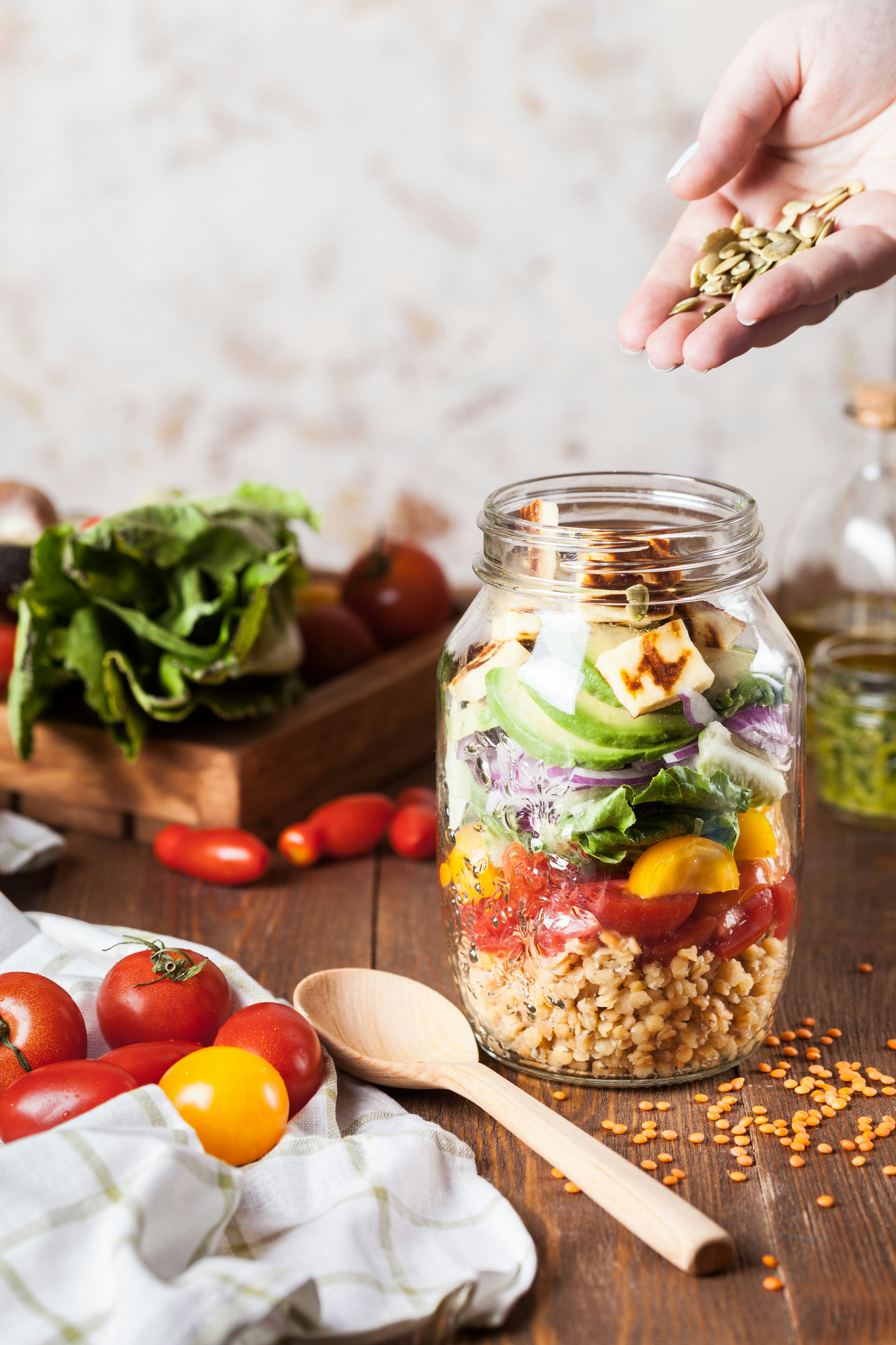Lentil salad with fried cheese in a jar